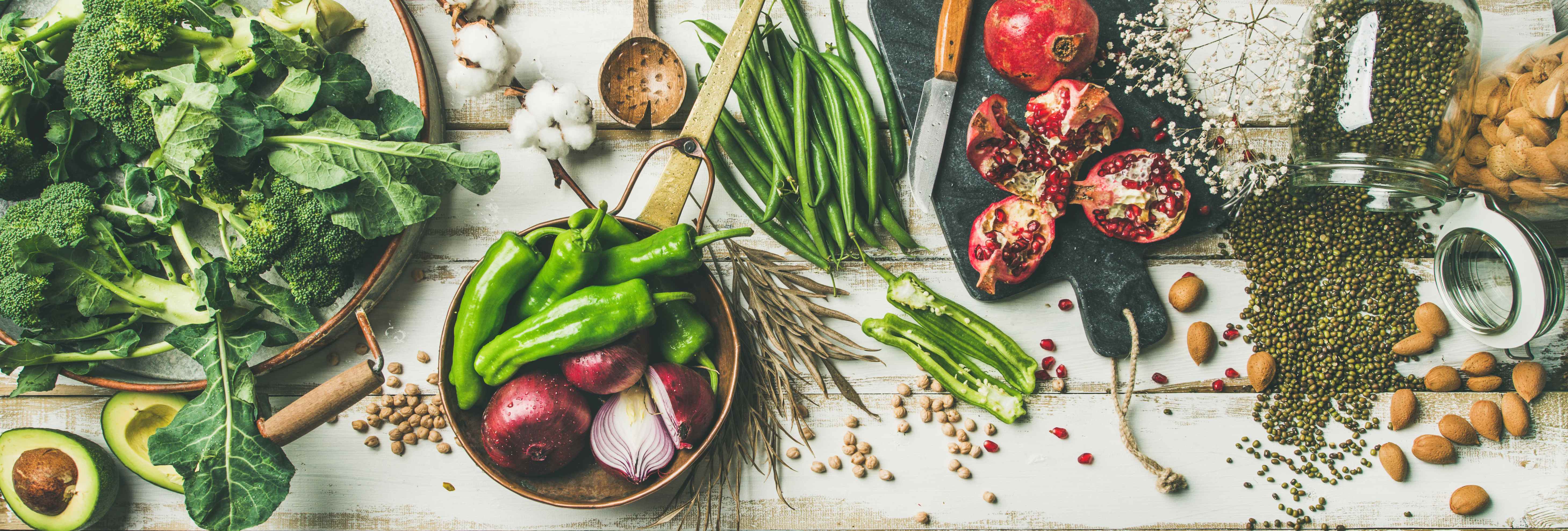 Assortment of fresh, healthy ingredients on a rustic wooden background